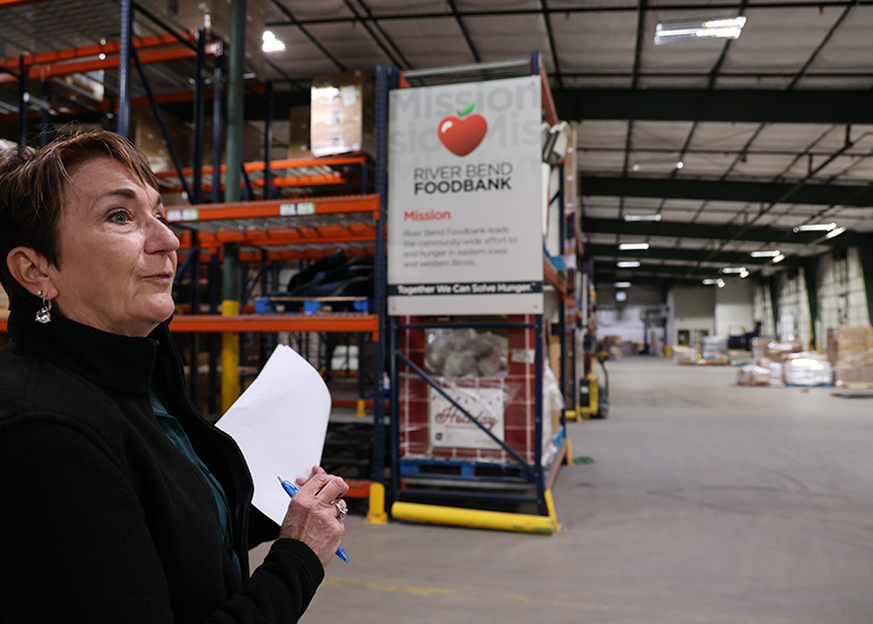 Dorie, Director of Donor Relations, gives Electro Freeze a tour of River Bend Foodbank's newly remodeled facility