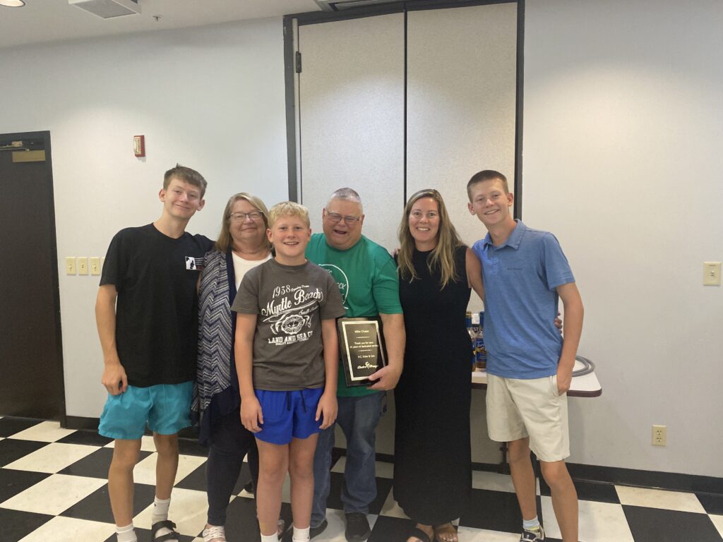 Electro Freeze&reg; employee celebrates his retirement after 43 years of service in the engineering department with his family